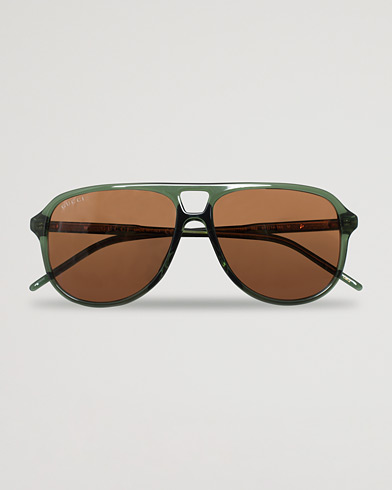Herr | Care of Carl Pre-owned | Pre-owned | Gucci GG1156S Sunglasses Green/Brown