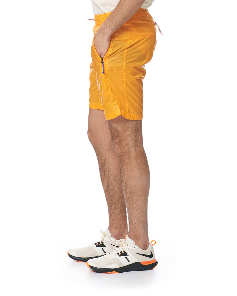 Herr | Shorts | Peak Performance | Ben Gorham Windbreaker Shorts Orange