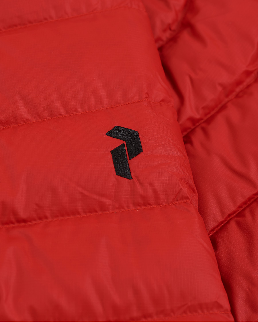 Herr | Jackor | Peak Performance | Frost Liner Down Hooded Jacket Red