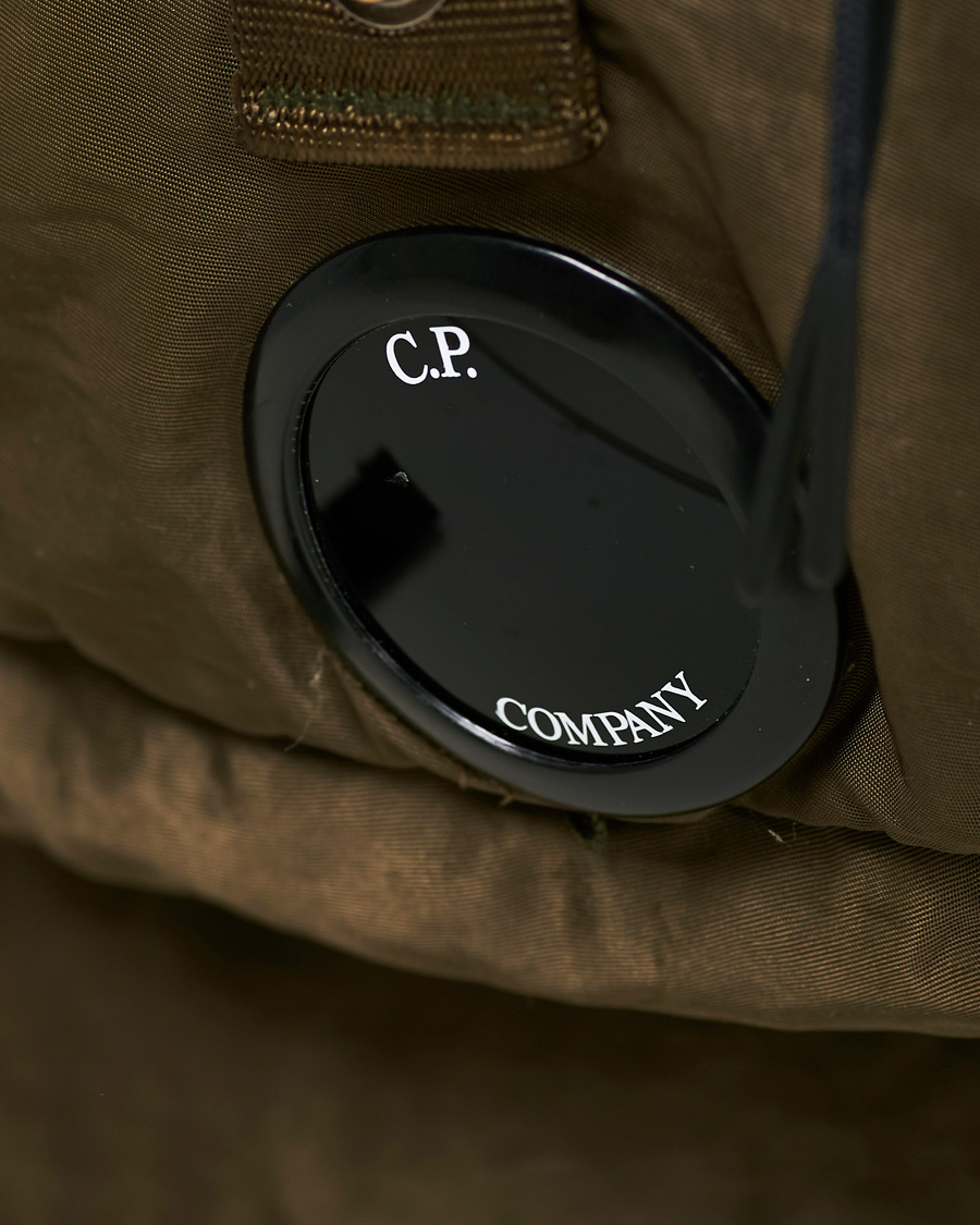 Herr | C.P. Company Garmend Dyed Nylon Lens Backpack Olive | C.P. Company | Garmend Dyed Nylon Lens Backpack Olive