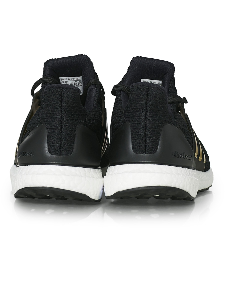 Herr | adidas Performance Ultraboost 4.0 DNA Sneaker Core Black/Gold | adidas Performance | Ultraboost 4.0 DNA Sneaker Core Black/Gold