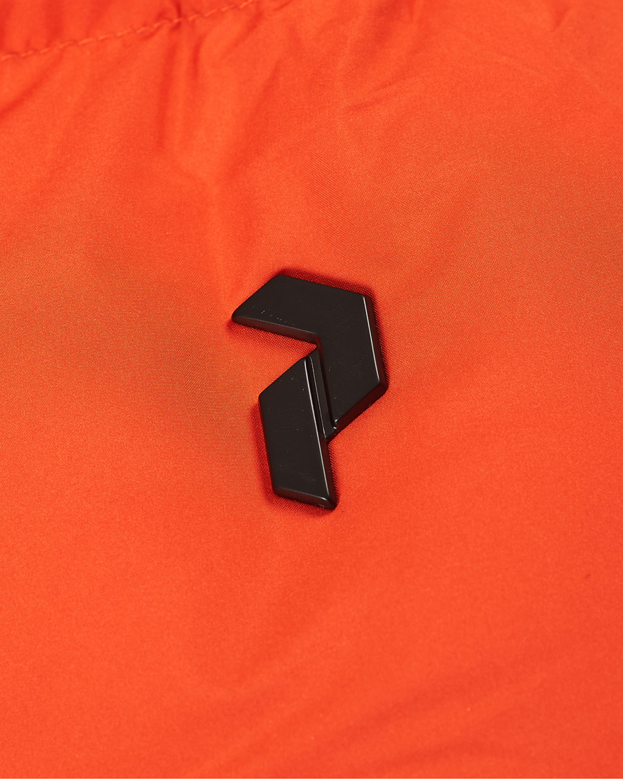 Herr | Jackor | Peak Performance | Rivel Down Hooded Jacket Orange