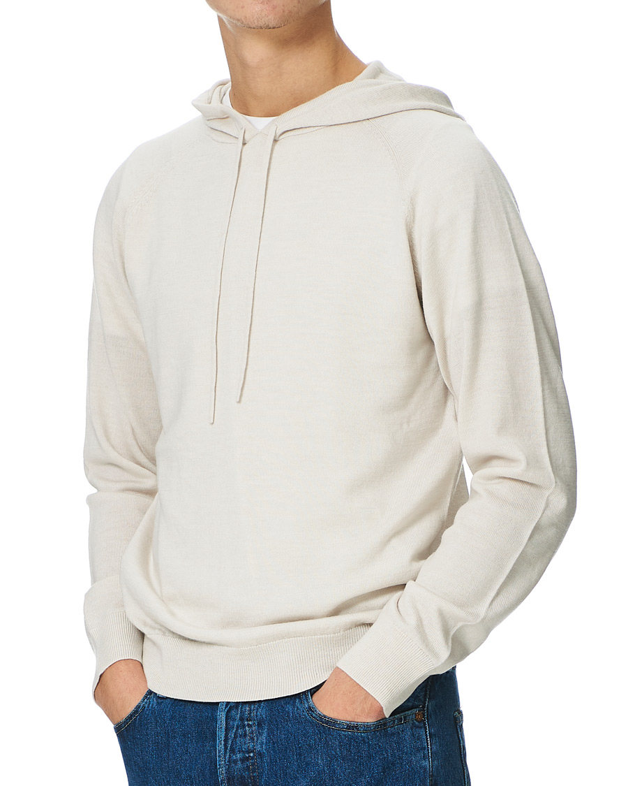 Herr | Tröjor | Tiger of Sweden | Nakkne Knitted Merino Hood Buttercreme