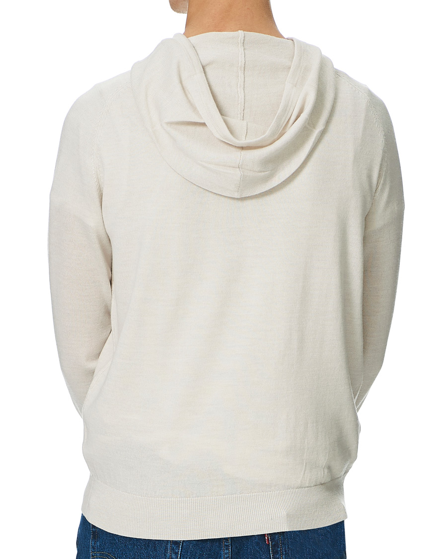 Herr | Tröjor | Tiger of Sweden | Nakkne Knitted Merino Hood Buttercreme