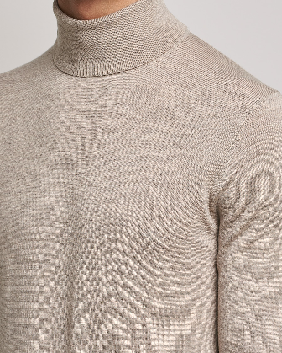 Herr | Tröjor | Tiger of Sweden | Neville Extra Fine Merino Polo Beige Melange