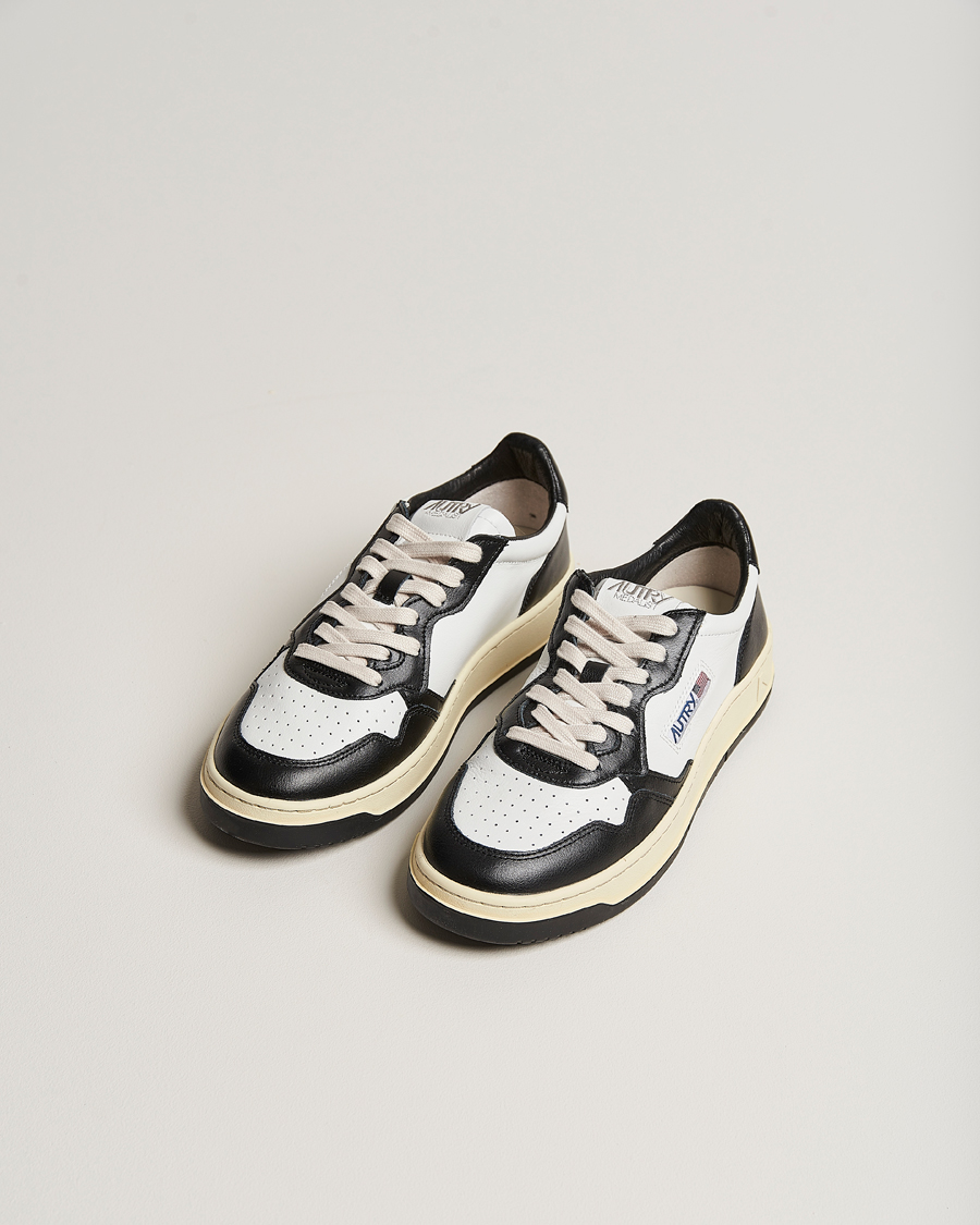 Herr | Sneakers | Autry | Medalist Low Super Soft Goat Leather Sneaker White/Black