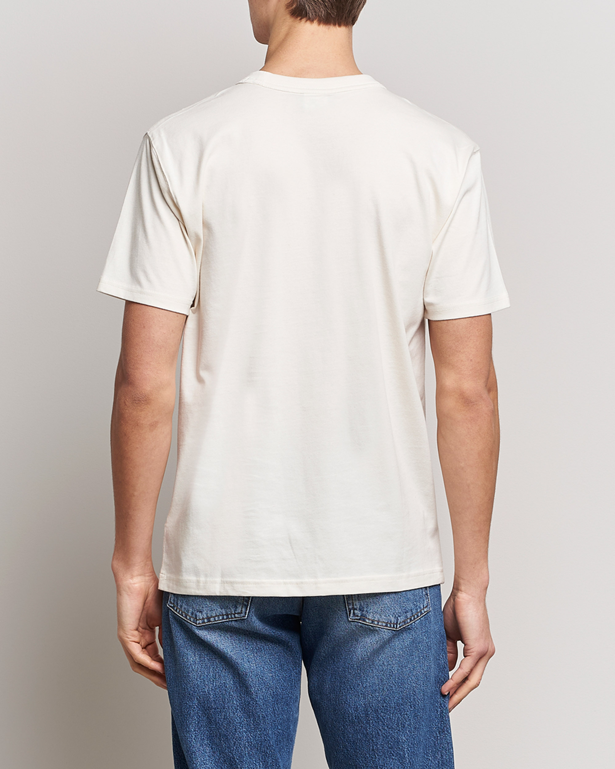 Herr | T-Shirts | New Balance | Athletics 90s Graphic T-Shirt Greige