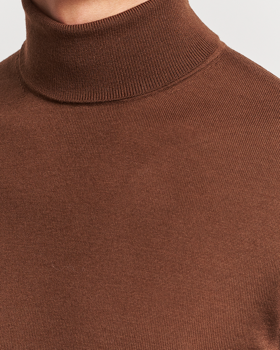 Herr | Tröjor | Tiger of Sweden | Nevile Extra Fine Merino Polo Golden Copper