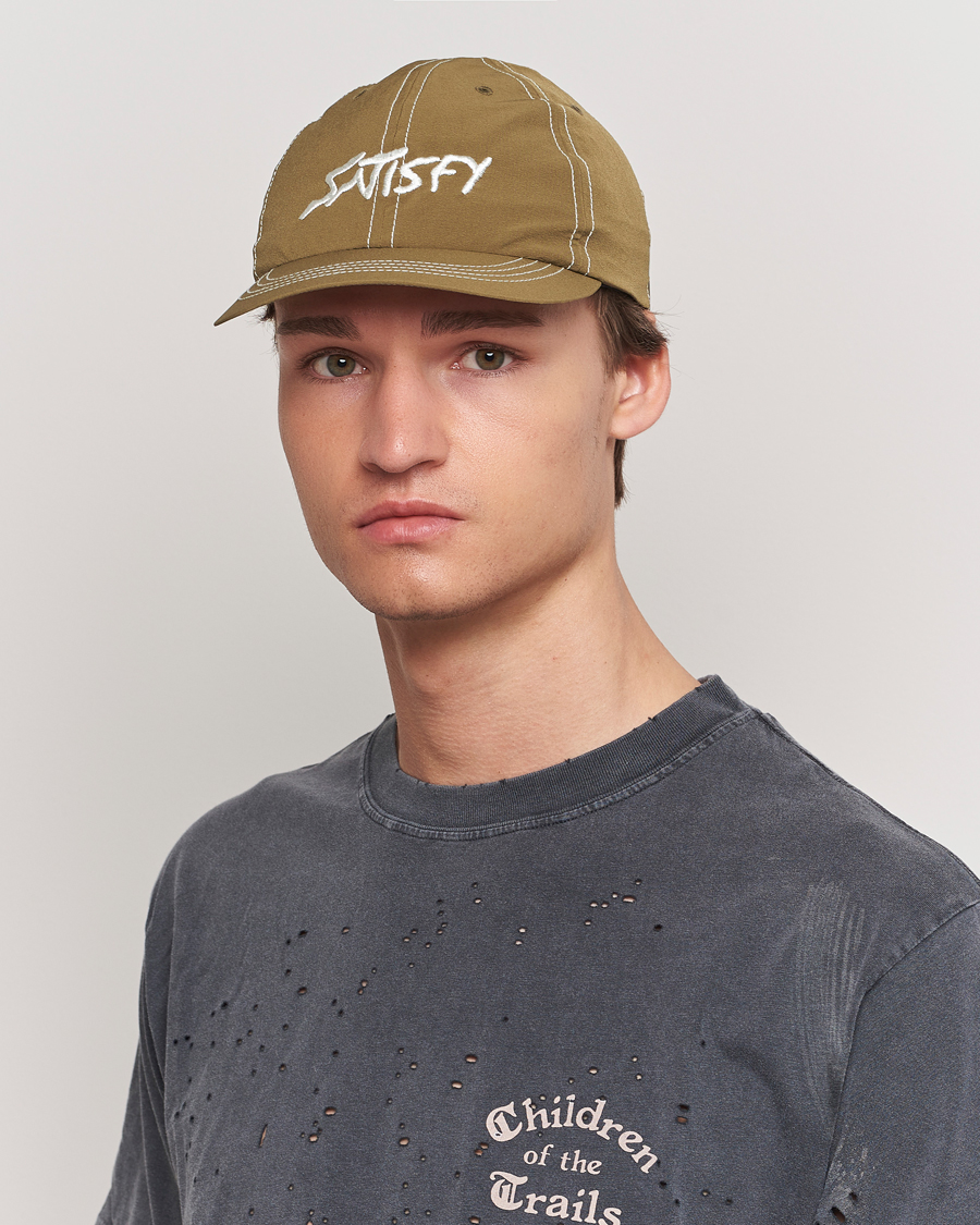 Herr | Satisfy PeaceShell Running Cap Oil Green | Satisfy | PeaceShell Running Cap Oil Green