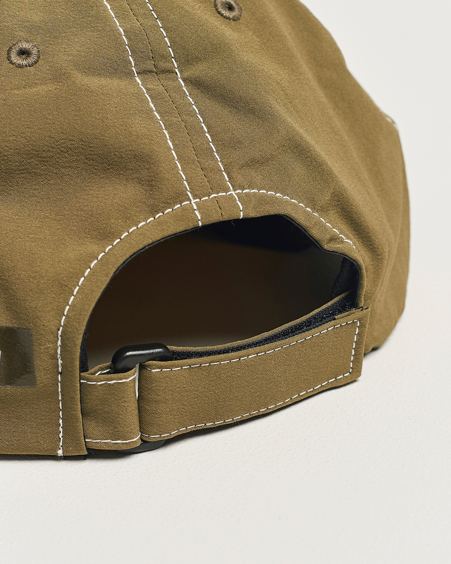 Herr | Satisfy PeaceShell Running Cap Oil Green | Satisfy | PeaceShell Running Cap Oil Green