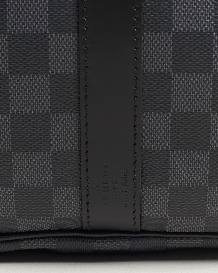Herr | Louis Vuitton Pre-Owned Keepall Bandoulière 55 Damier Graphite | Louis Vuitton Pre-Owned | Keepall Bandoulière 55 Damier Graphite