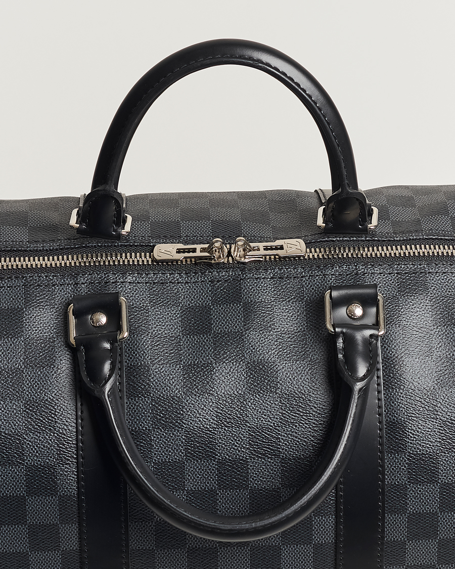 Herr | Louis Vuitton Pre-Owned Keepall Bandoulière 55 Damier Graphite | Louis Vuitton Pre-Owned | Keepall Bandoulière 55 Damier Graphite