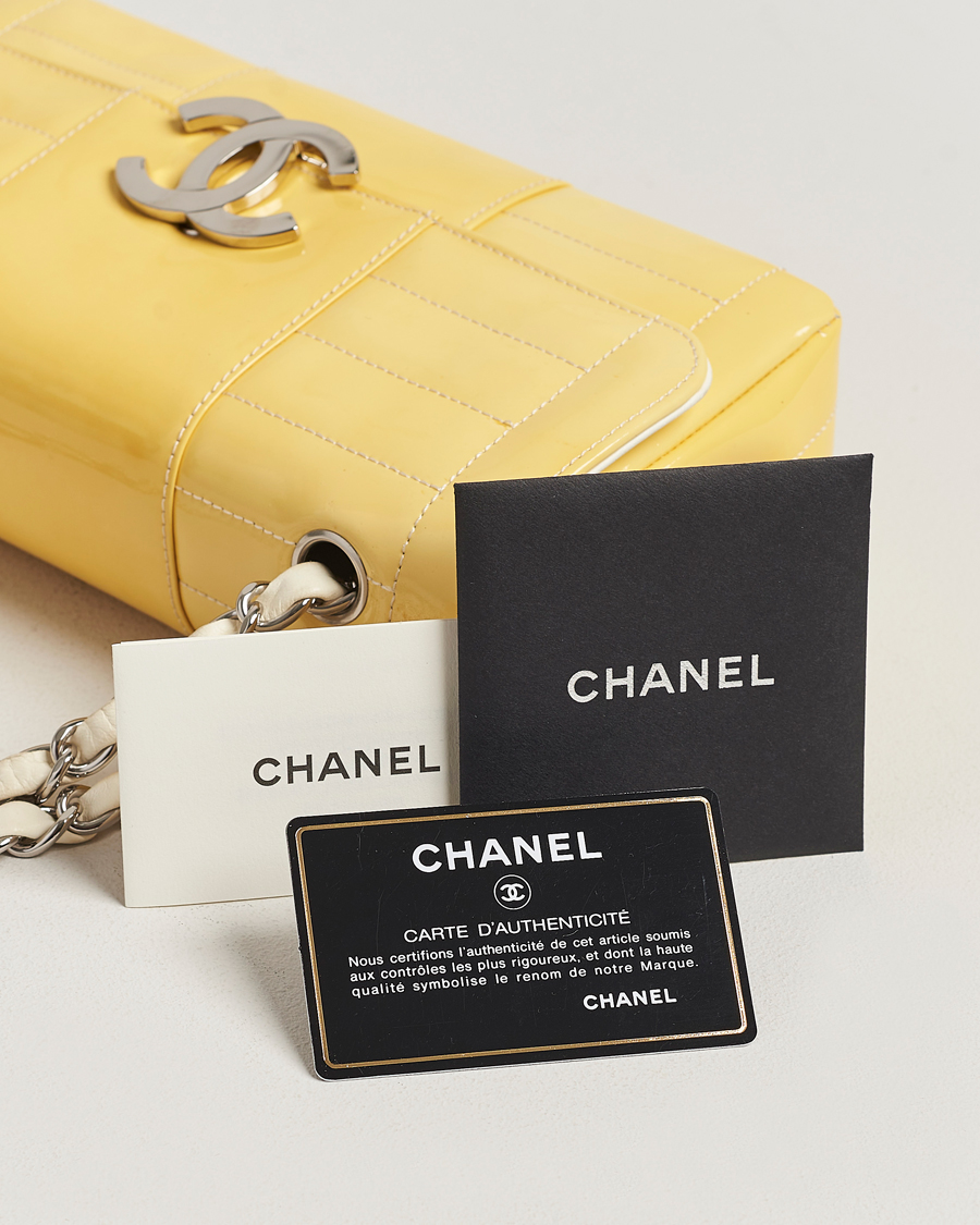 Herr | Chanel Pre-Owned Patent Flap Bag Yellow | Chanel Pre-Owned | Patent Flap Bag Yellow