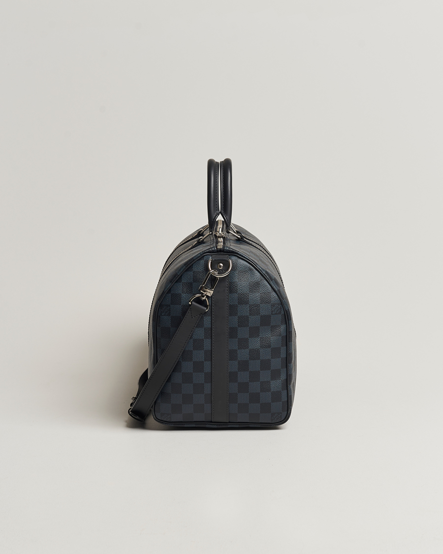 Herr | Louis Vuitton Pre-Owned Keepall Bandoulière 45 Damier Graphite | Louis Vuitton Pre-Owned | Keepall Bandoulière 45 Damier Graphite