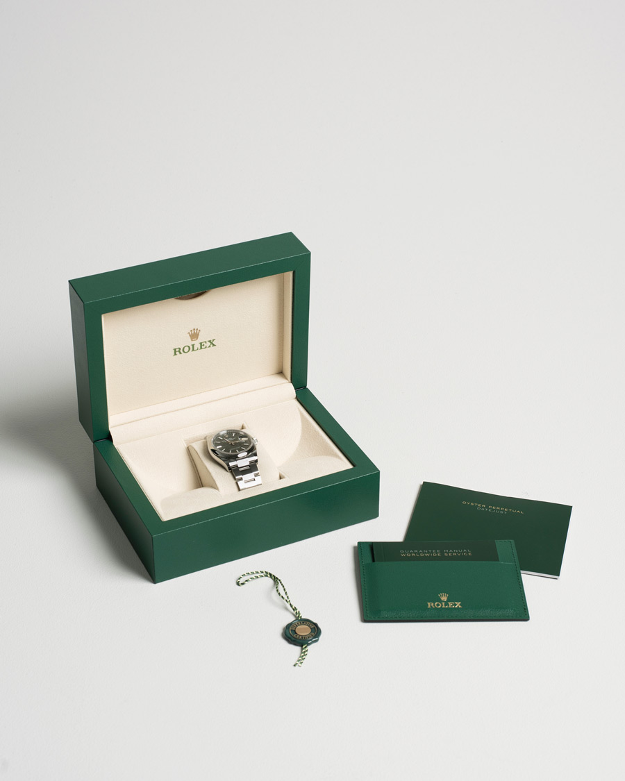 Herr | Rolex Pre-Owned Datejust Palm Motif 126200 Silver | Rolex Pre-Owned | Datejust Palm Motif 126200 Silver