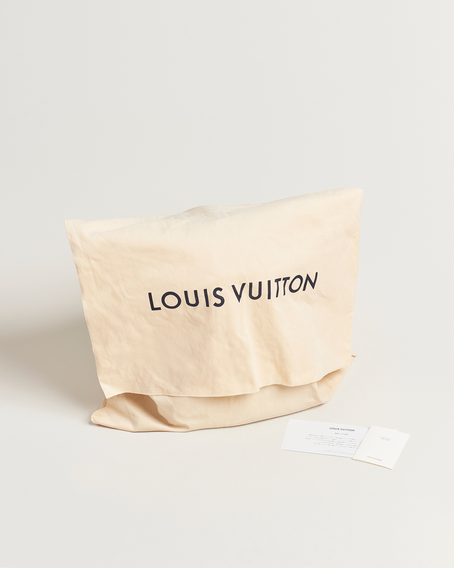 Herr | Pre-Owned & Vintage Bags | Louis Vuitton Pre-Owned | Discovery Backpack PM Grey