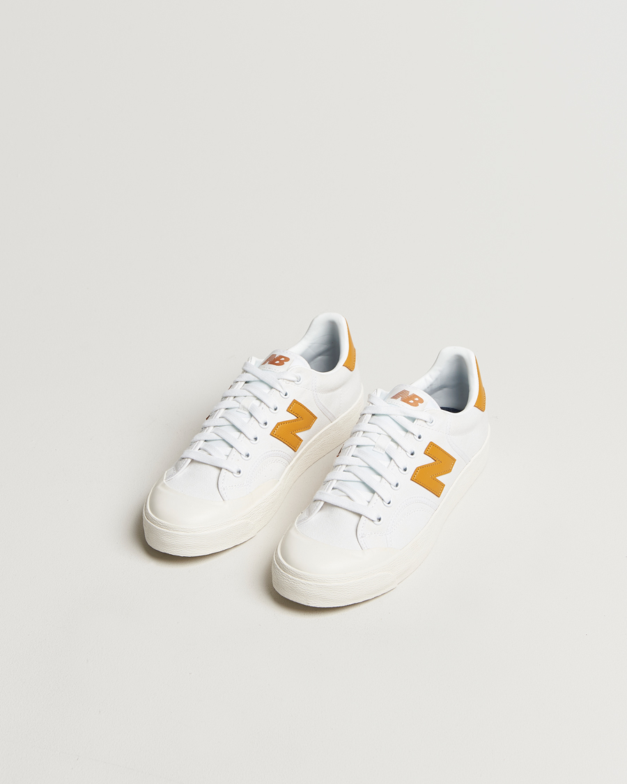 Herr | New Balance B100 Sneakers White/Yellow | New Balance | B100 Sneakers White/Yellow