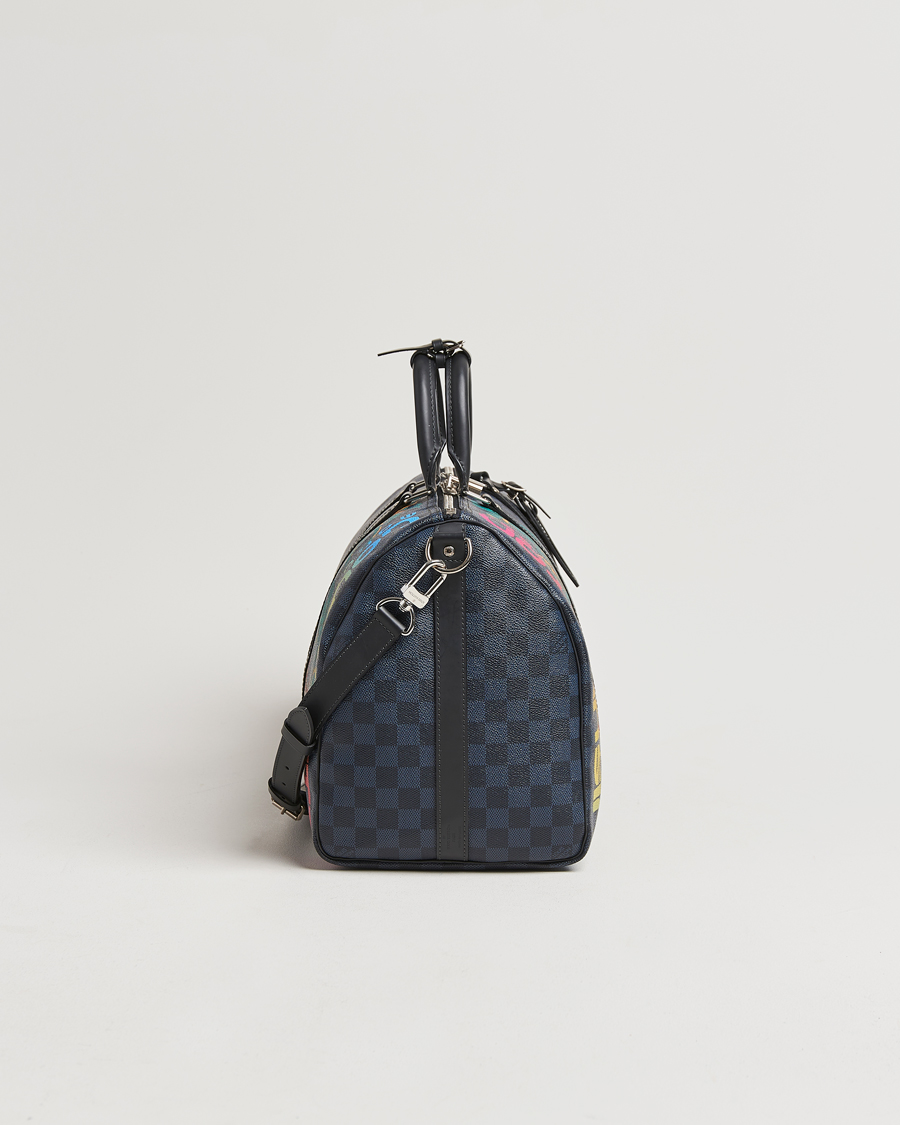Herr | Louis Vuitton Pre-Owned Keepall Bandoulière 45 Damier Cobalt Jungle | Louis Vuitton Pre-Owned | Keepall Bandoulière 45 Damier Cobalt Jungle