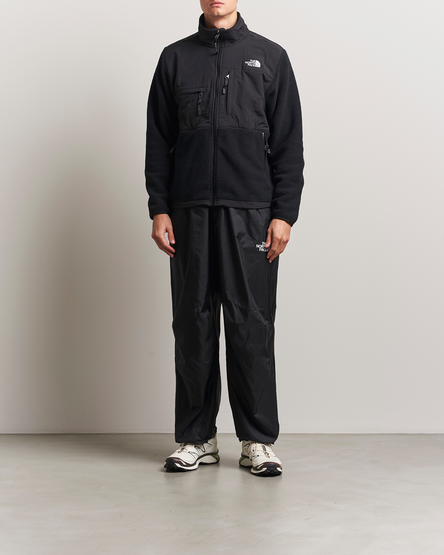 Herr | Byxor | The North Face | NSE Wind Track Pants Black
