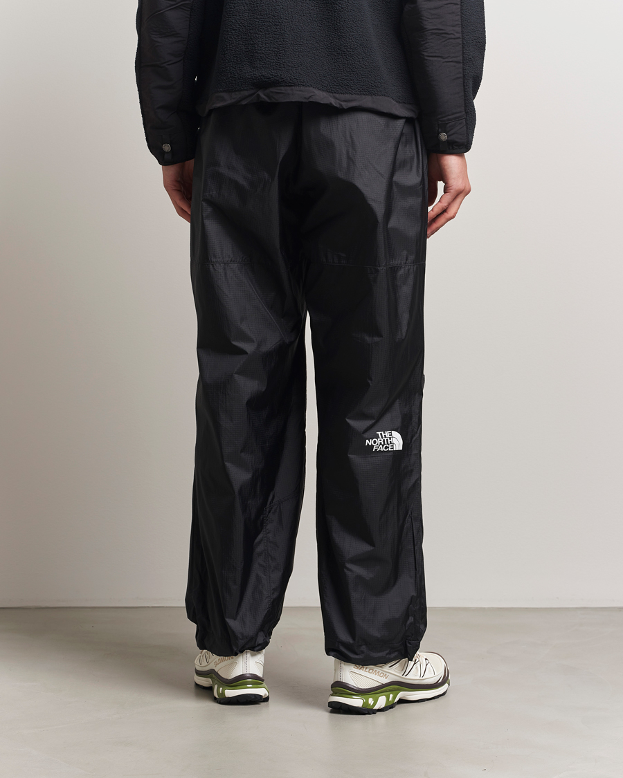 Herr | Byxor | The North Face | NSE Wind Track Pants Black