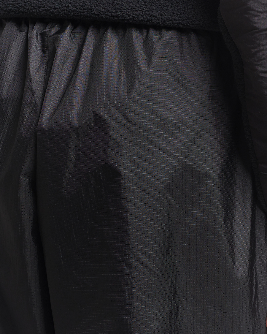 Herr | Byxor | The North Face | NSE Wind Track Pants Black