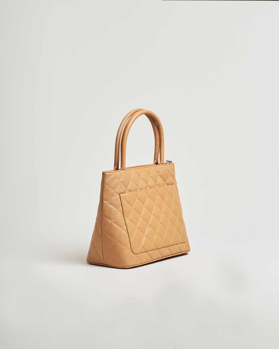 Herr | Chanel Pre-Owned Medallion Tote Quilted Caviar Beige | Chanel Pre-Owned | Medallion Tote Quilted Caviar Beige