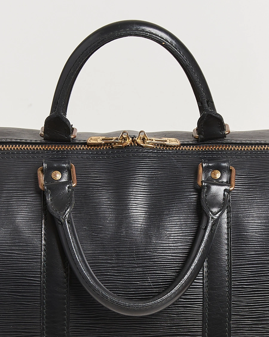 Herr | Pre-Owned & Vintage Bags | Louis Vuitton Pre-Owned | Keepall 50 Epi Leather Black