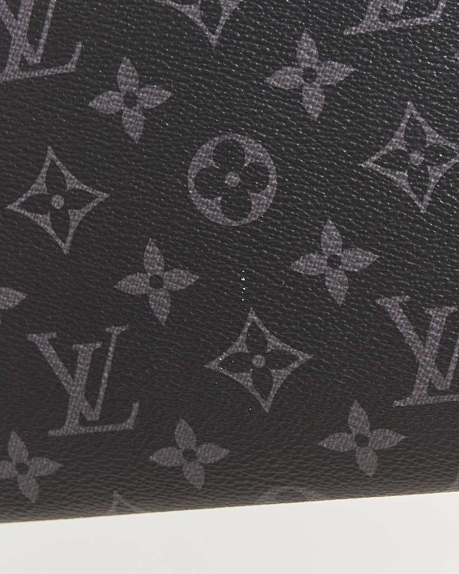 Herr | Pre-Owned & Vintage Bags | Louis Vuitton Pre-Owned | Pochette Jour Monogram Eclipse