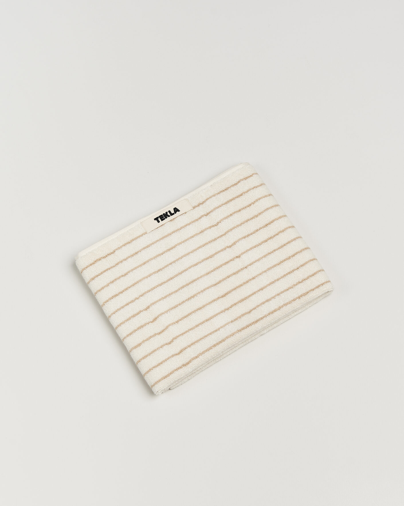 Herr | Textilier | Tekla | Organic Terry Hand Towel Sienna Stripes