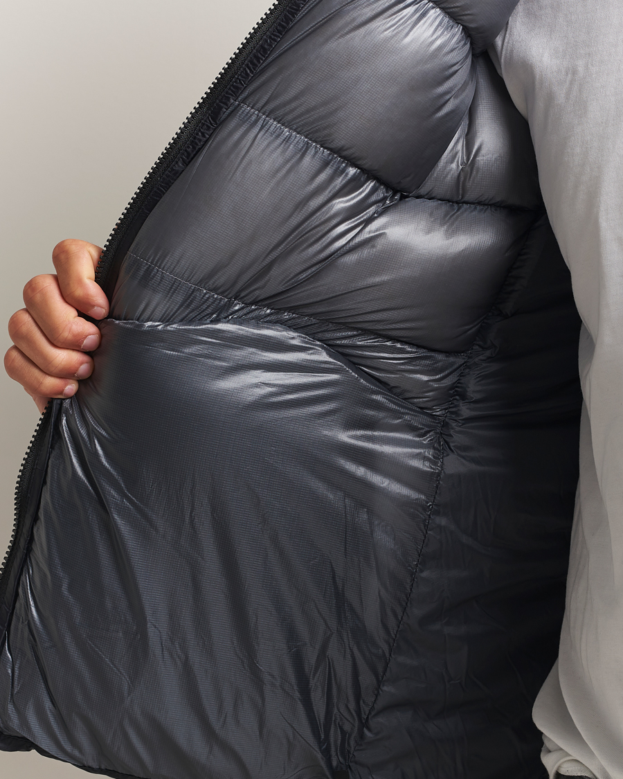 Herr | Jackor | Peak Performance | Helium Diamond Fused Hooded Down Jacket Black/Antarctica