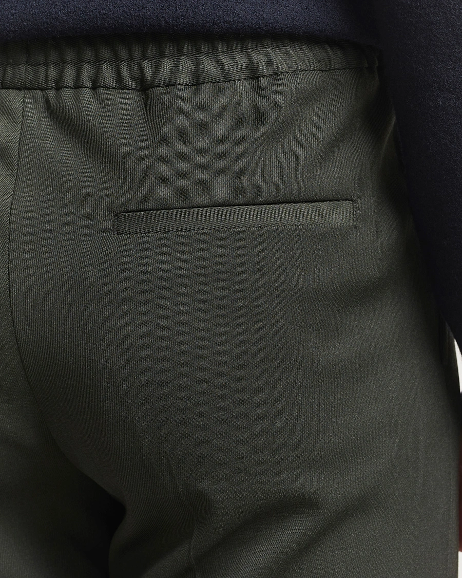 Herr | Byxor | Filippa K | Theo Relaxed Wool Trousers Green Melange