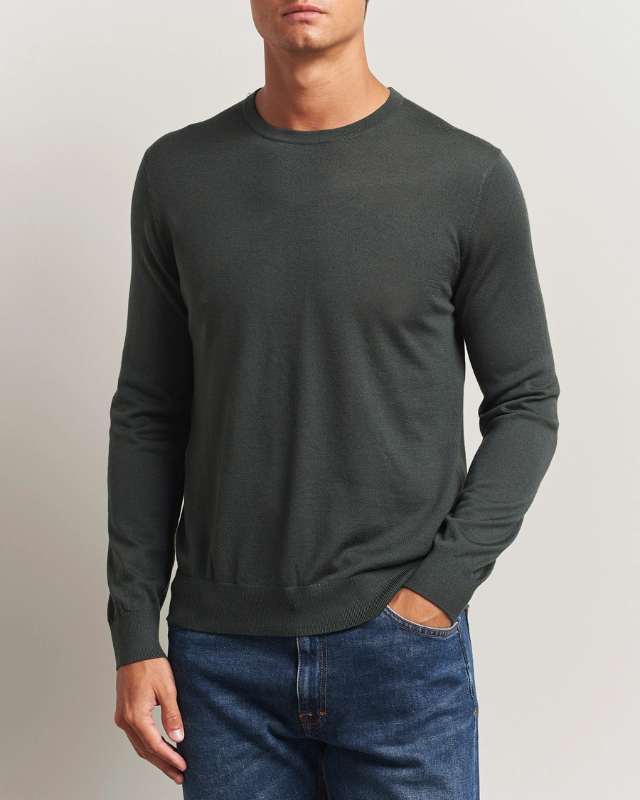 Herr | Tröjor | Tiger of Sweden | Connor Extra Fine Merino Crew Neck Pullover Midnight Green