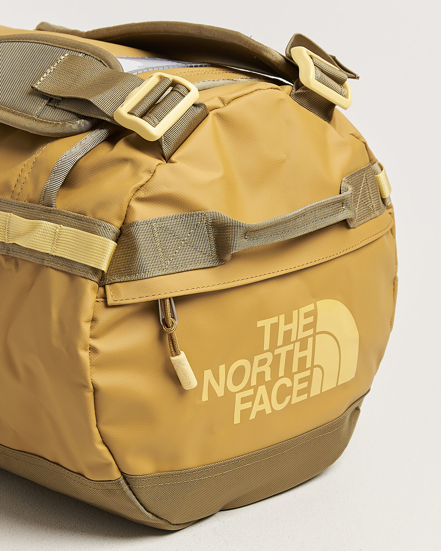 Herr | Väskor | The North Face | Base Camp Duffel S Golden Tan
