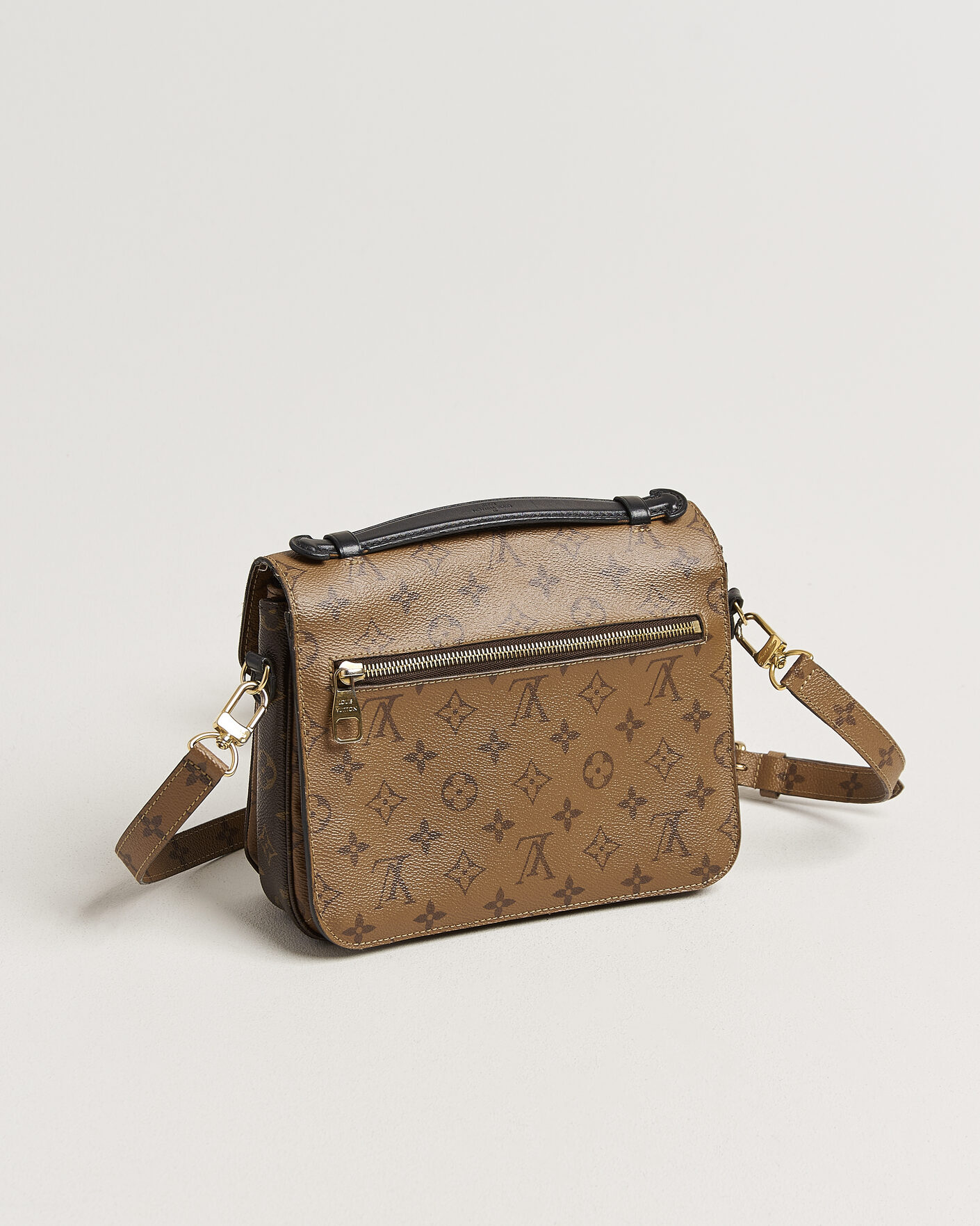 Herr | Pre-Owned & Vintage Bags | Louis Vuitton Pre-Owned | Pochette Métis Reverse Monogram