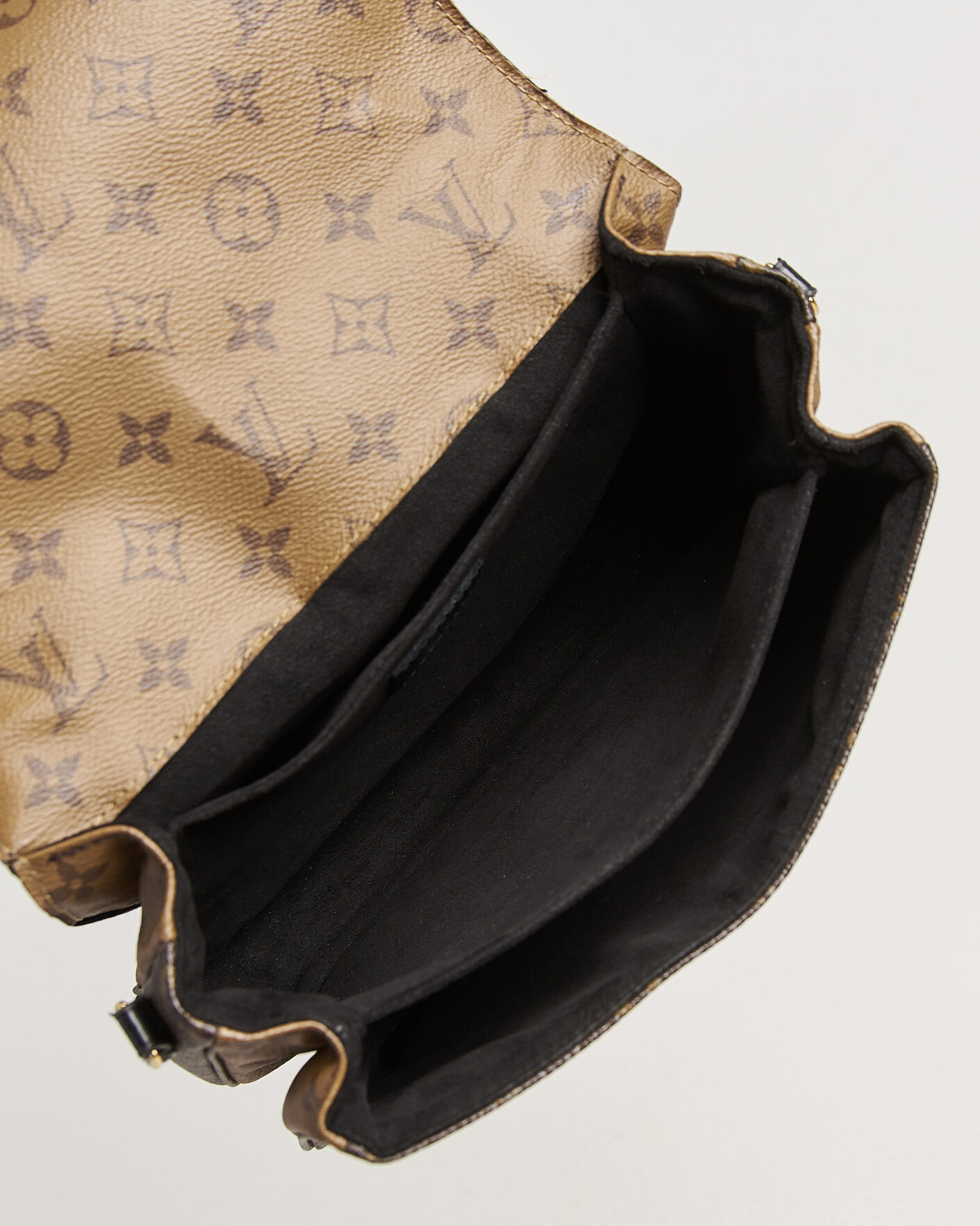 Herr | Pre-Owned & Vintage Bags | Louis Vuitton Pre-Owned | Pochette Métis Reverse Monogram