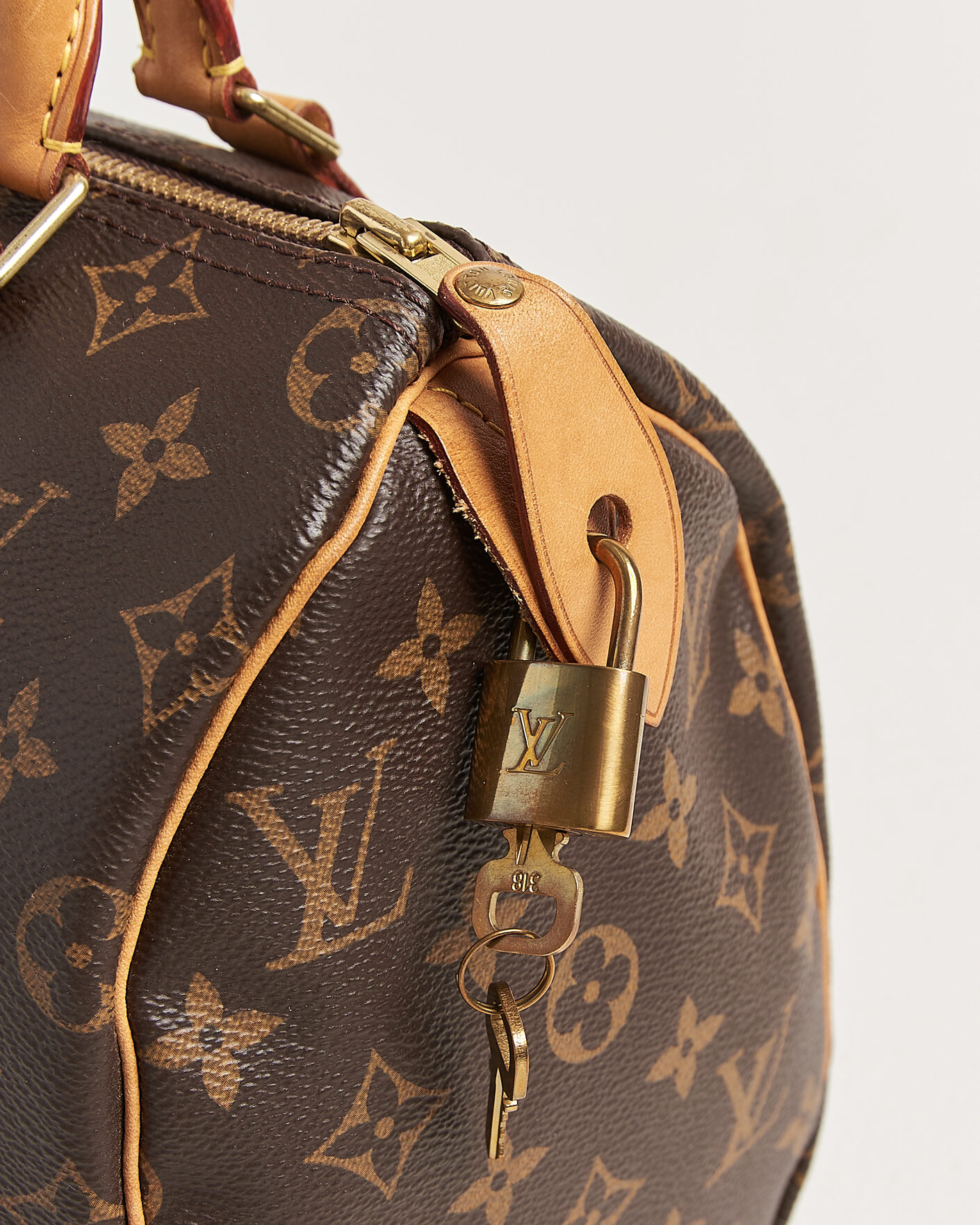 Herr | Pre-Owned & Vintage Bags | Louis Vuitton Pre-Owned | Speedy 25 Monogram