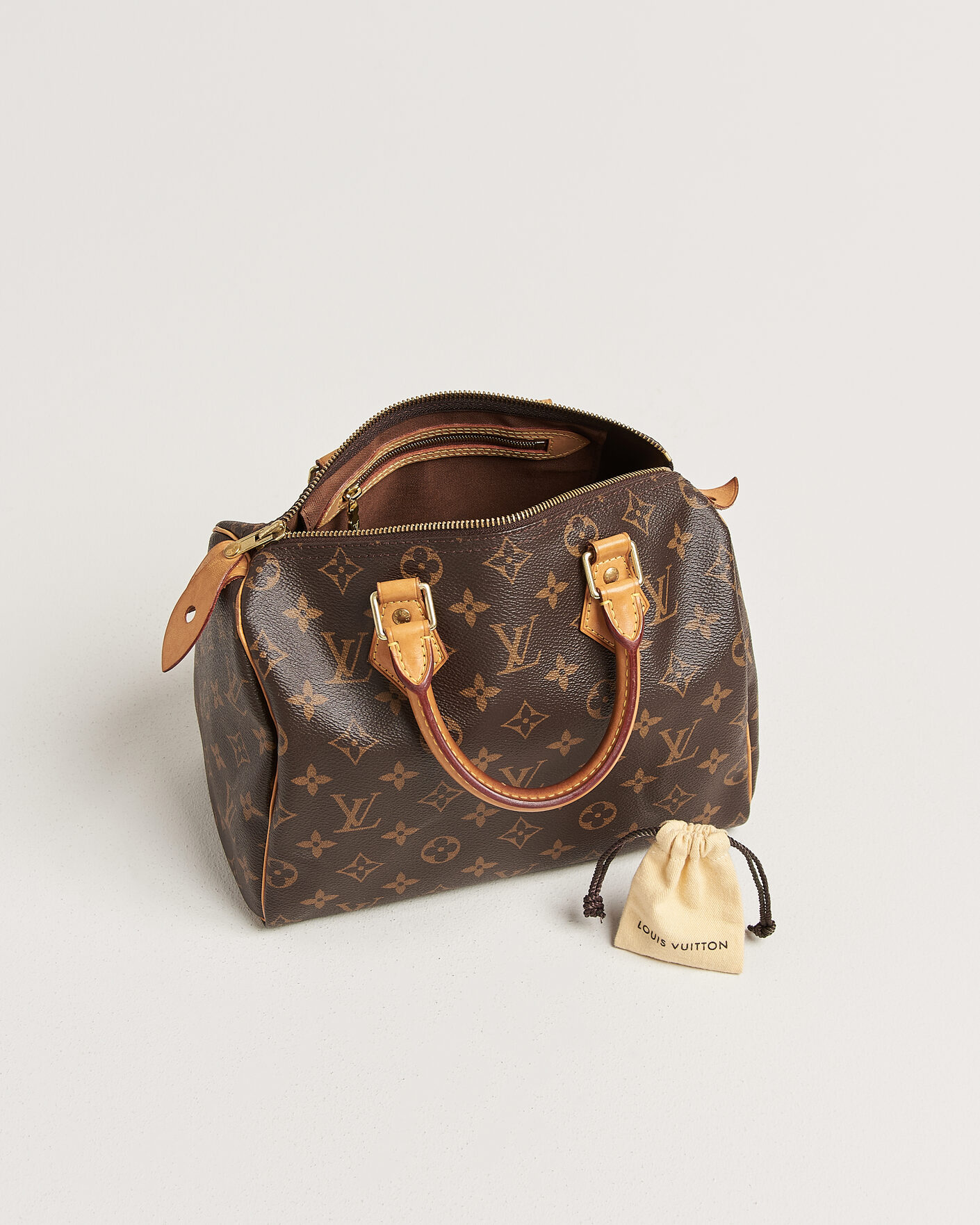 Herr | Pre-Owned & Vintage Bags | Louis Vuitton Pre-Owned | Speedy 25 Monogram