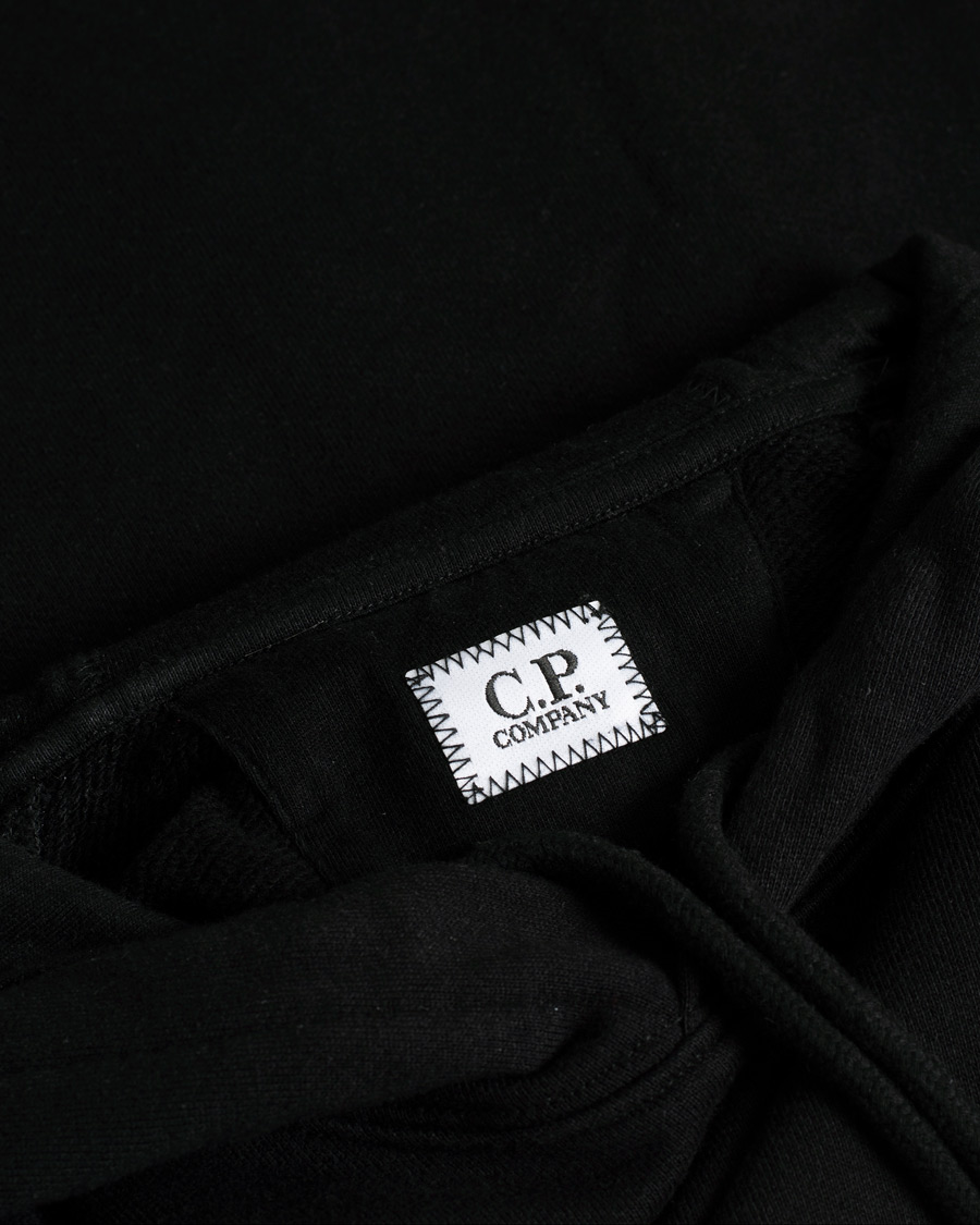 Herr | C.P. Company Diagonal Raised Fleece Hooded Lens Sweatshirt Black | Pre-owned | C.P. Company Diagonal Raised Fleece Hooded Lens Sweatshirt Black